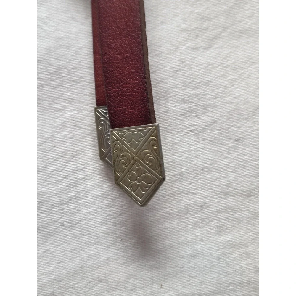 Vintage Canadian Leather Bolo Tie‎ with Totem Design and Decorative Metal Tips
